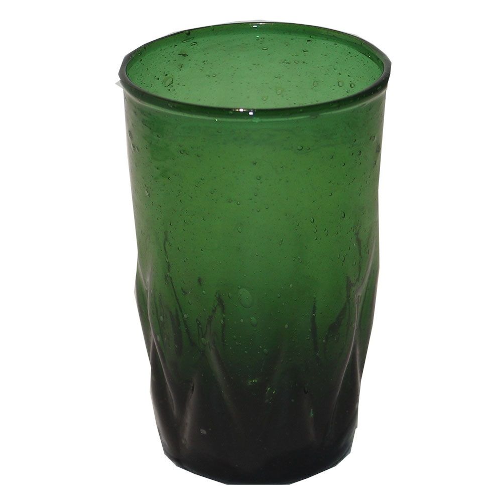 Vandglas i gennem farvet grønt glas